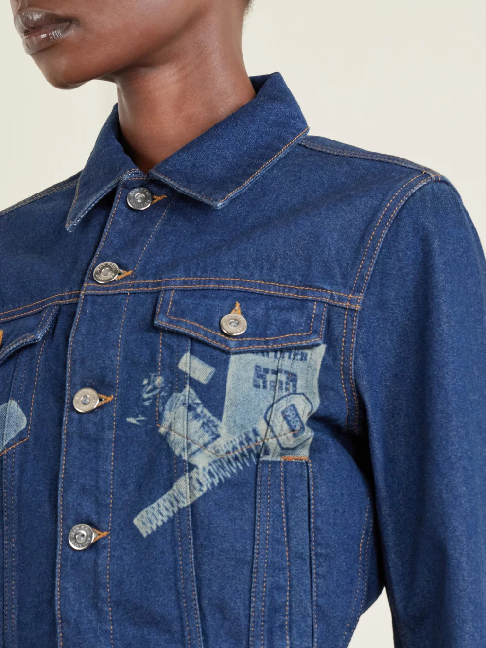Close-up detail of the Jean Paul Gaultier Cropped Printed Denim Jacket