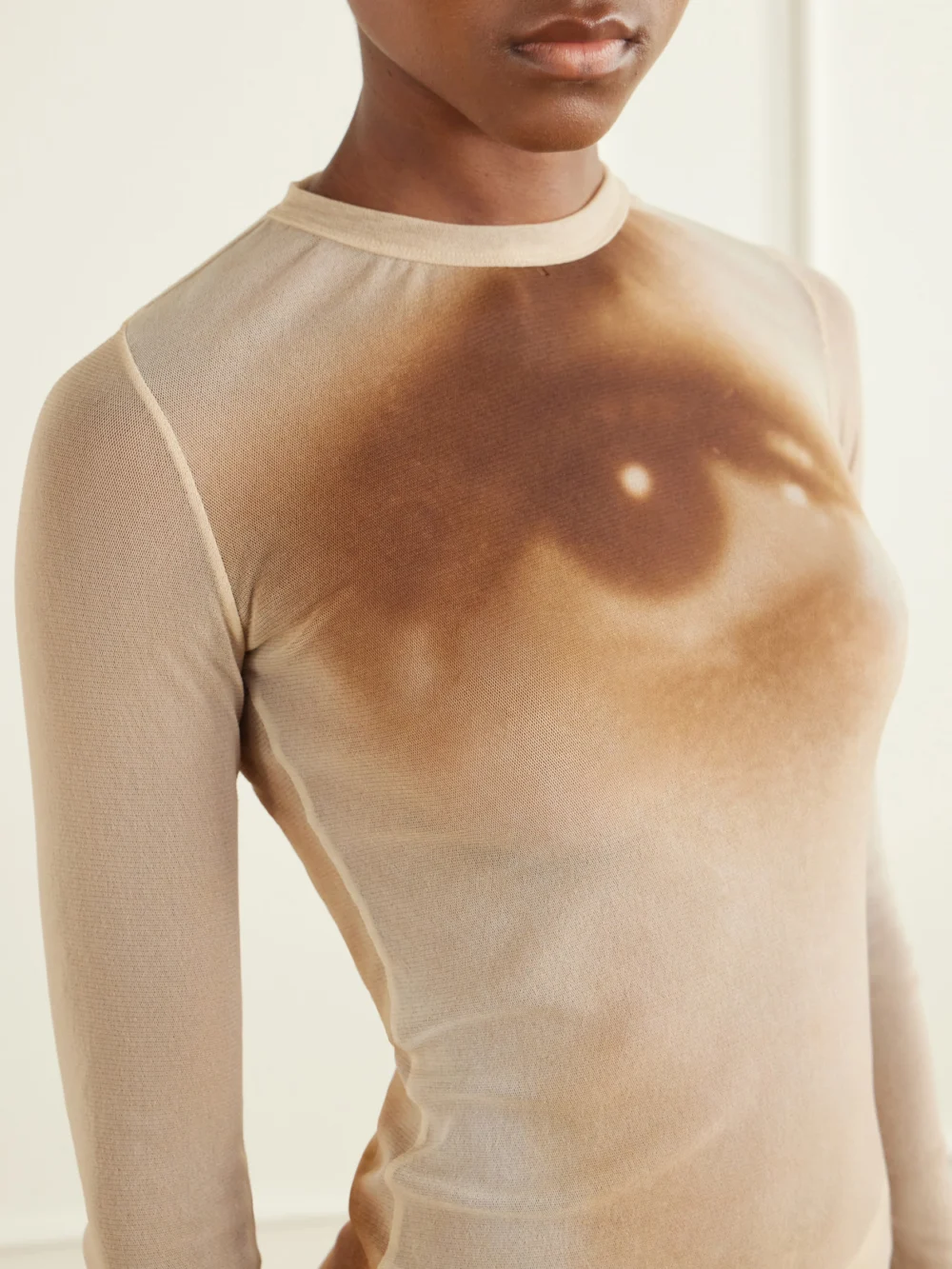 Close-up detail of the Jean Paul Gaultier Face Printed Mesh Blouse