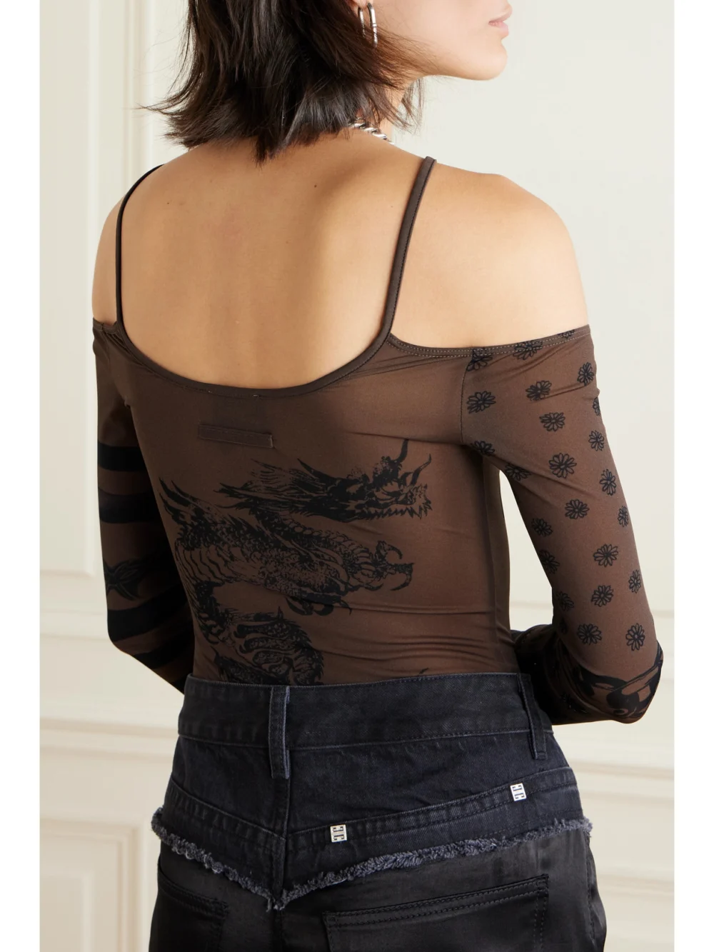 Back view of the Jean Paul Gaultier + Knwls Cold-shoulder Printed Stretch-jersey Bodysuit