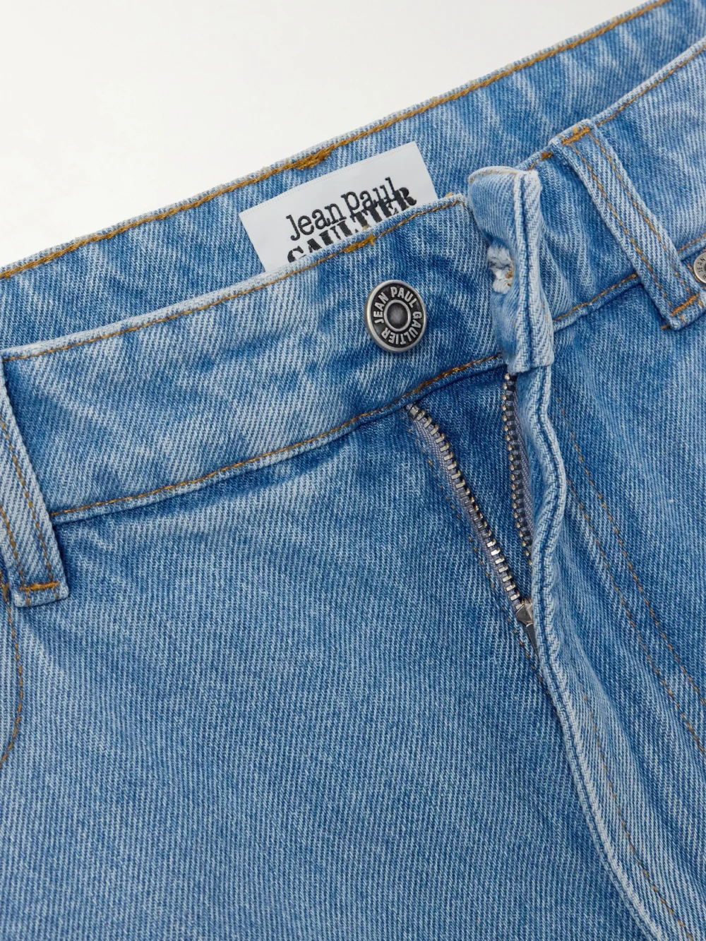 Close-up detail of the Jean Paul Gaultier Layered High-rise Wide-leg Jeans