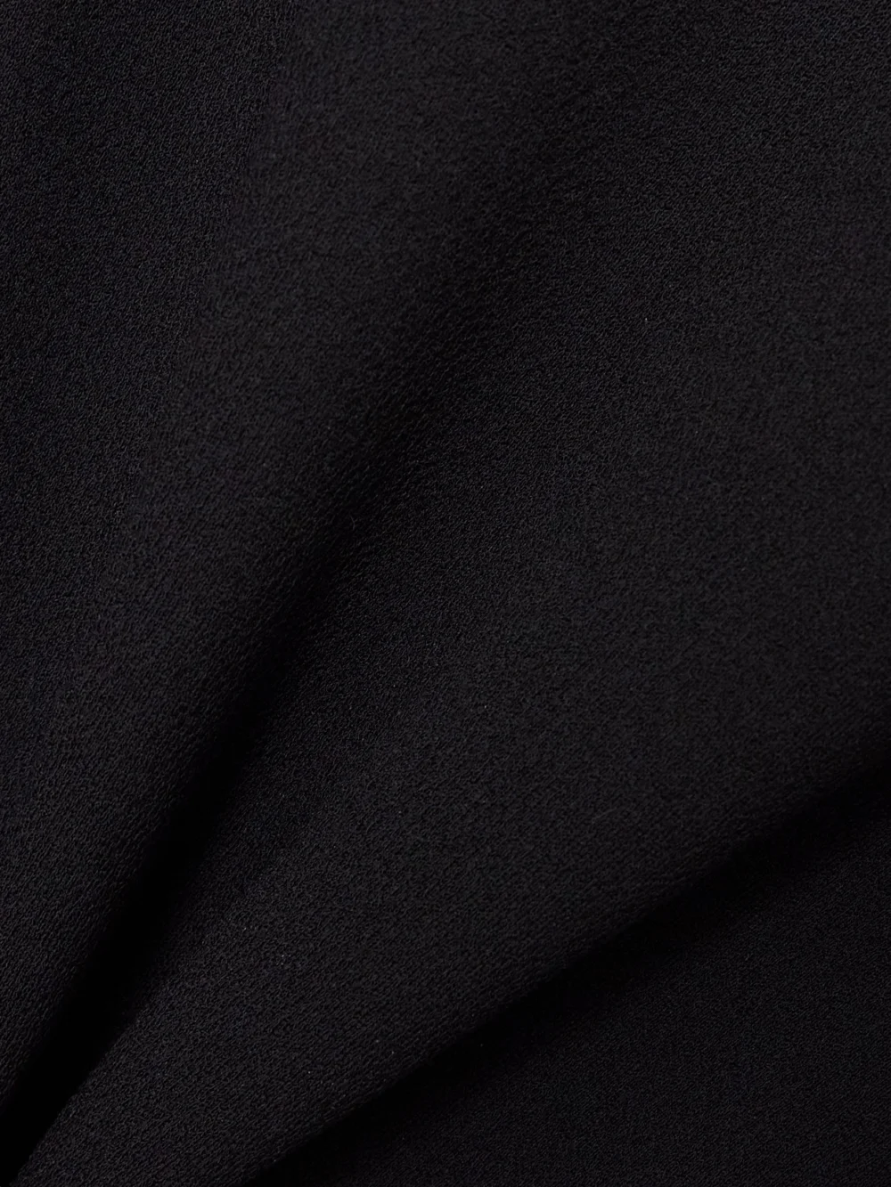 Close-up detail of the Jean Paul Gaultier Open-back Hooded Paneled Crepe-jersey Mini Dress