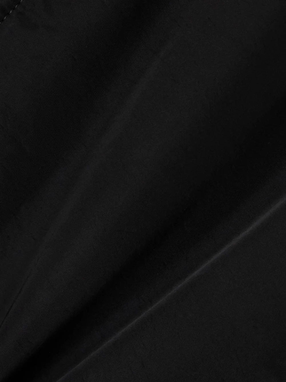 Close-up detail of the Jean Paul Gaultier Oversized Hooded Shell Bomber Jacket