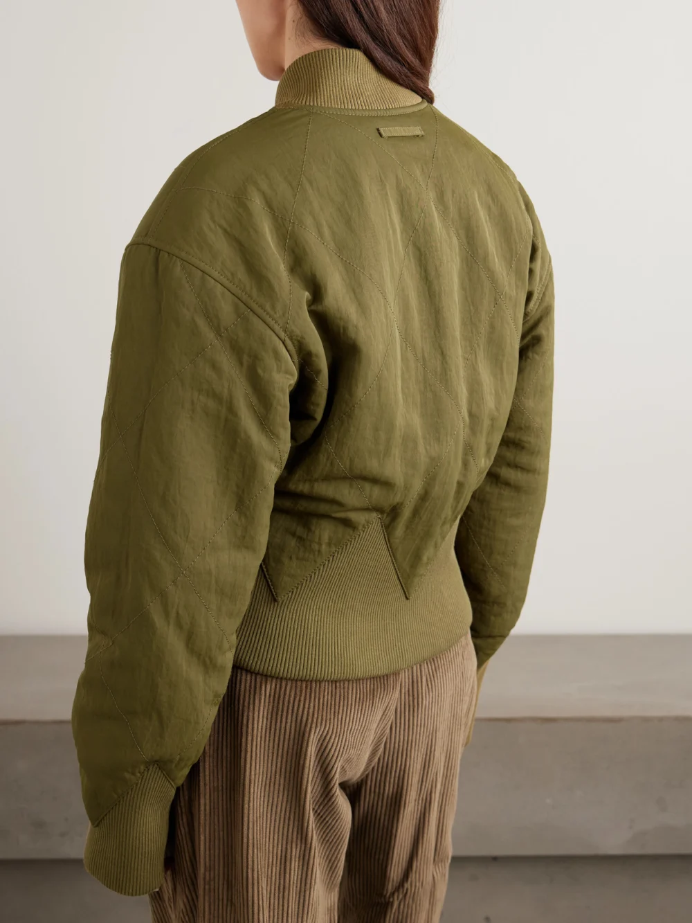 Back view of the Jean Paul Gaultier Paneled Quilted Recycled-shell Bomber Jacket
