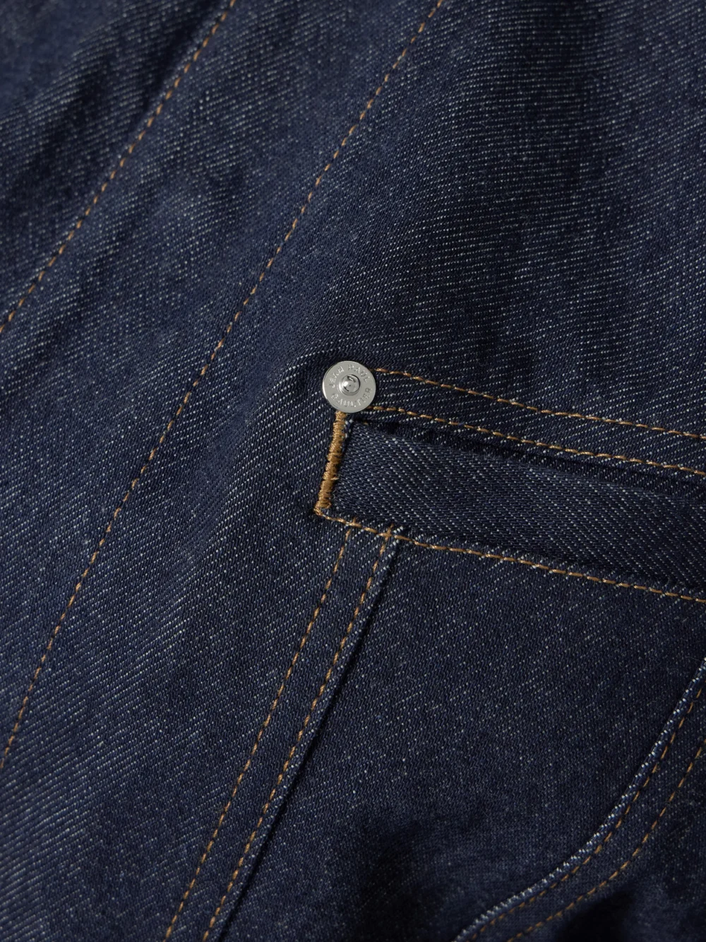 Close-up detail of the Jean Paul Gaultier Paneled Topstitched Denim Jacket