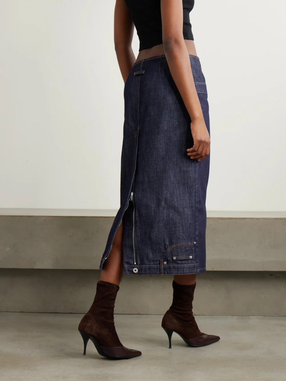 Back view of the Jean Paul Gaultier Paneled Topstitched Denim Midi Skirt
