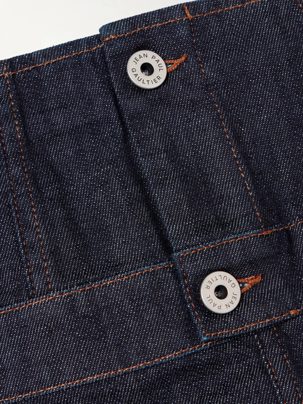 Close-up detail of the Jean Paul Gaultier Paneled Topstitched Denim Midi Skirt