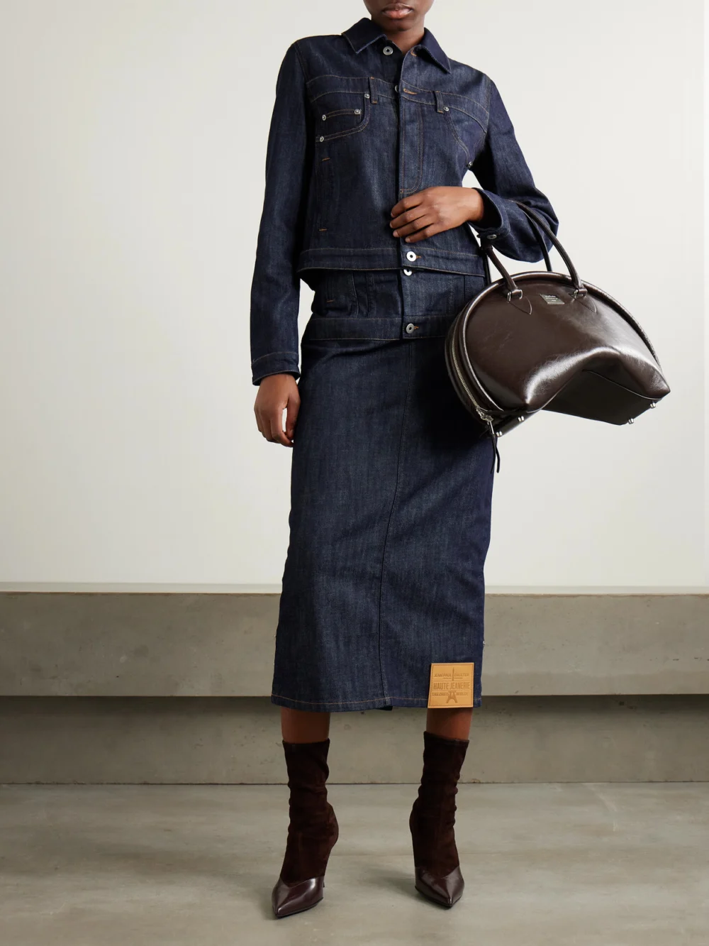 Jean Paul Gaultier Paneled Topstitched Denim Midi Skirt, worn by a model