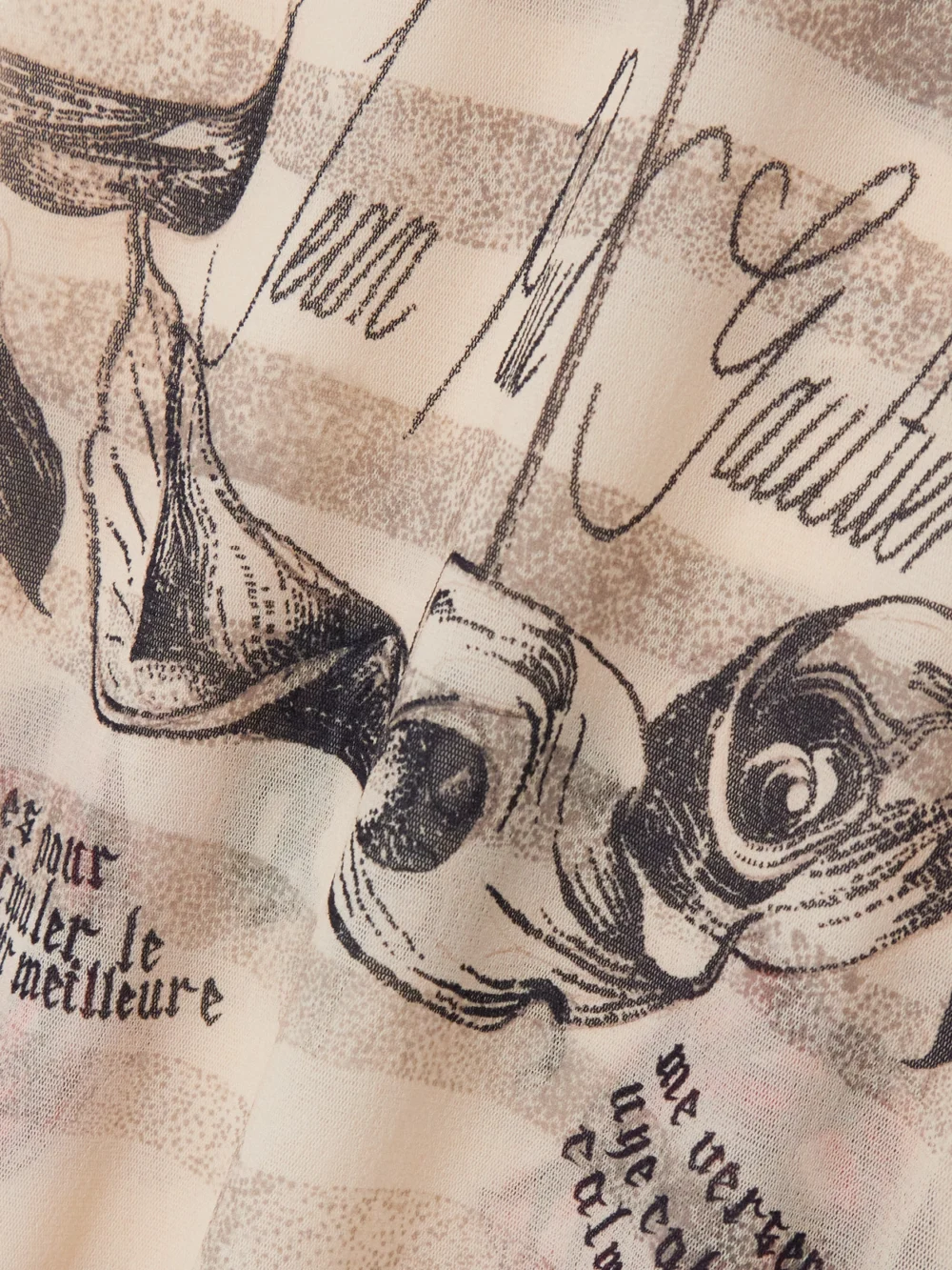 Close-up detail of the Jean Paul Gaultier Printed Mesh Maxi Dress