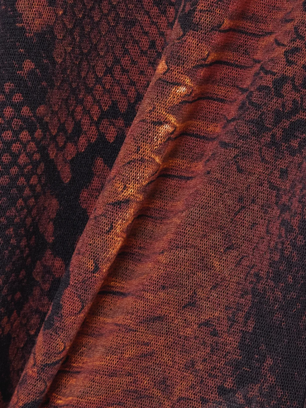 Close-up detail of the Jean Paul Gaultier Snake-print Mesh Top
