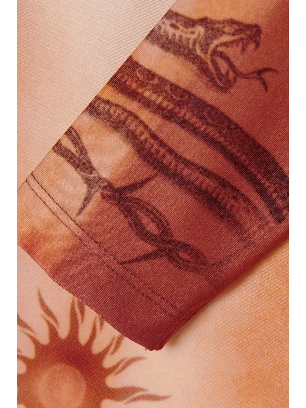 Close-up detail of the Jean Paul Gaultier Trompe L'oeil Printed Stretch-jersey Bodysuit