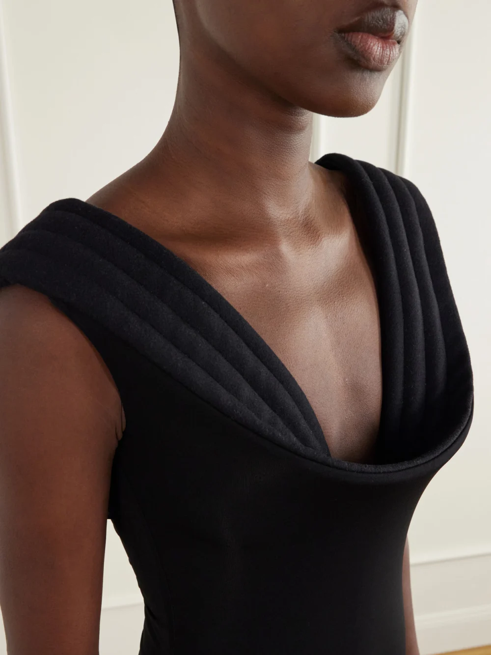 Close-up detail of the Jean Paul Gaultier Wool-trimmed Stretch-crepe Jersey Bodysuit