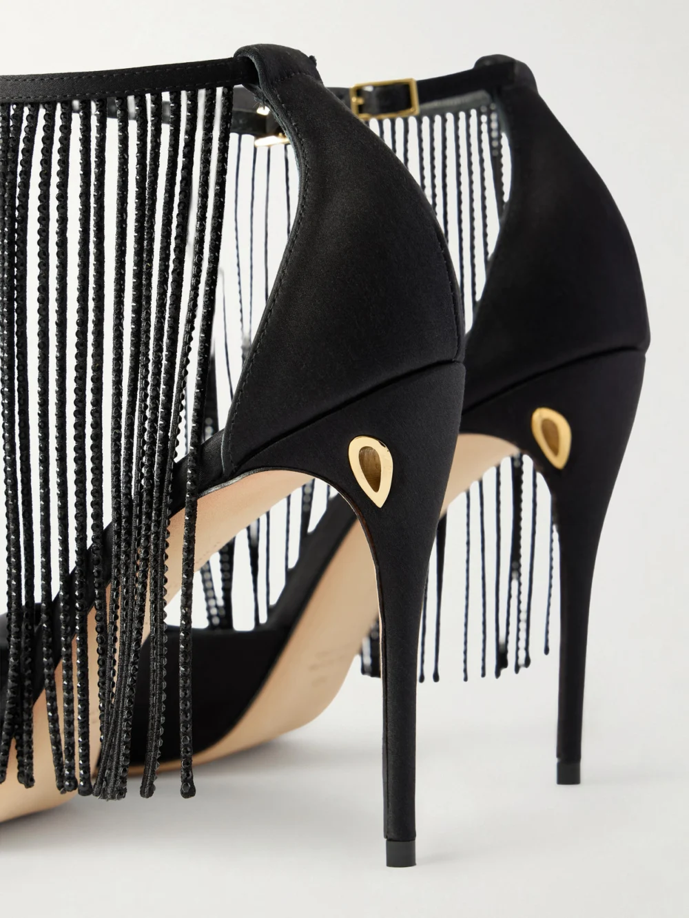 Close-up detail of the Jennifer Chamandi Fernando 105 Crystal-embellished Fringed Satin Pumps