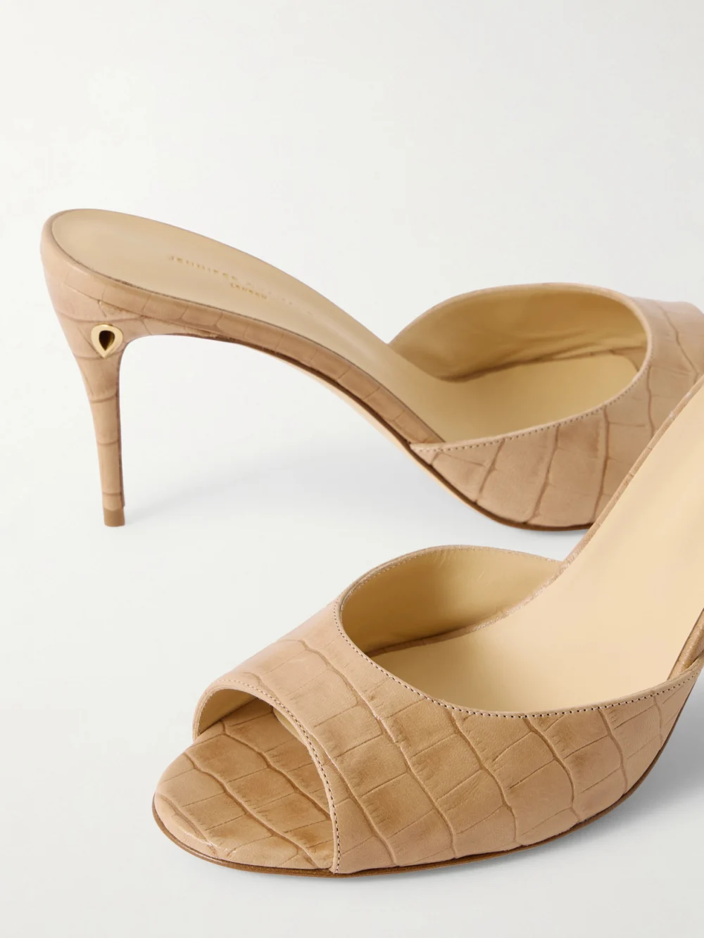 Close-up detail of the Jennifer Chamandi Guido 85 Croc-effect Leather Mules