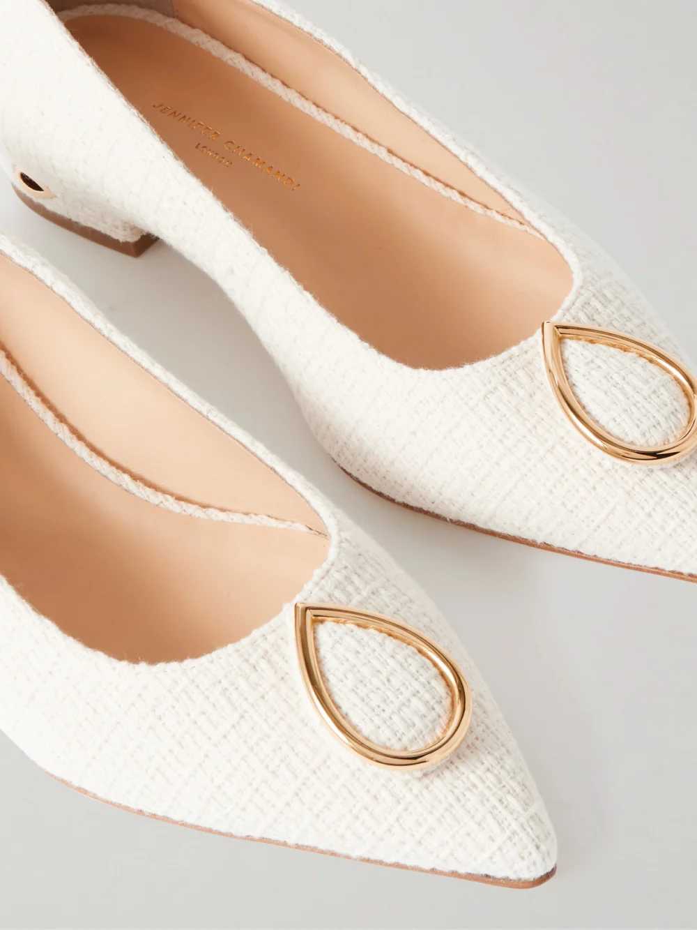 Close-up detail of the Jennifer Chamandi Lorenzo 20 Embellished Tweed Point-toe Pumps