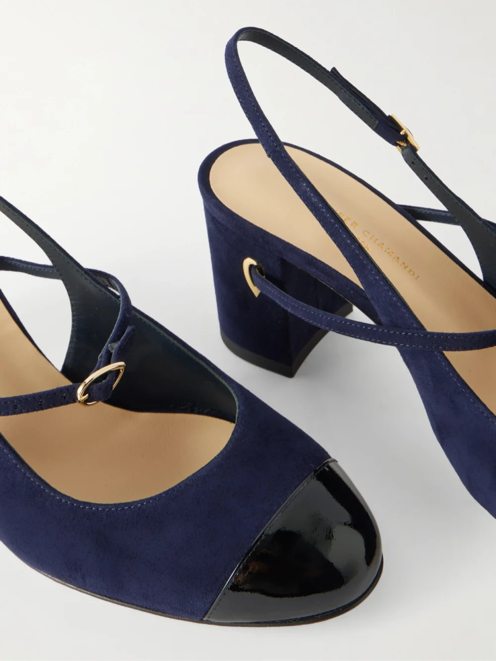 Close-up detail of the Jennifer Chamandi Mattia 65 Patent Leather-trimmed Suede Slingback Pumps