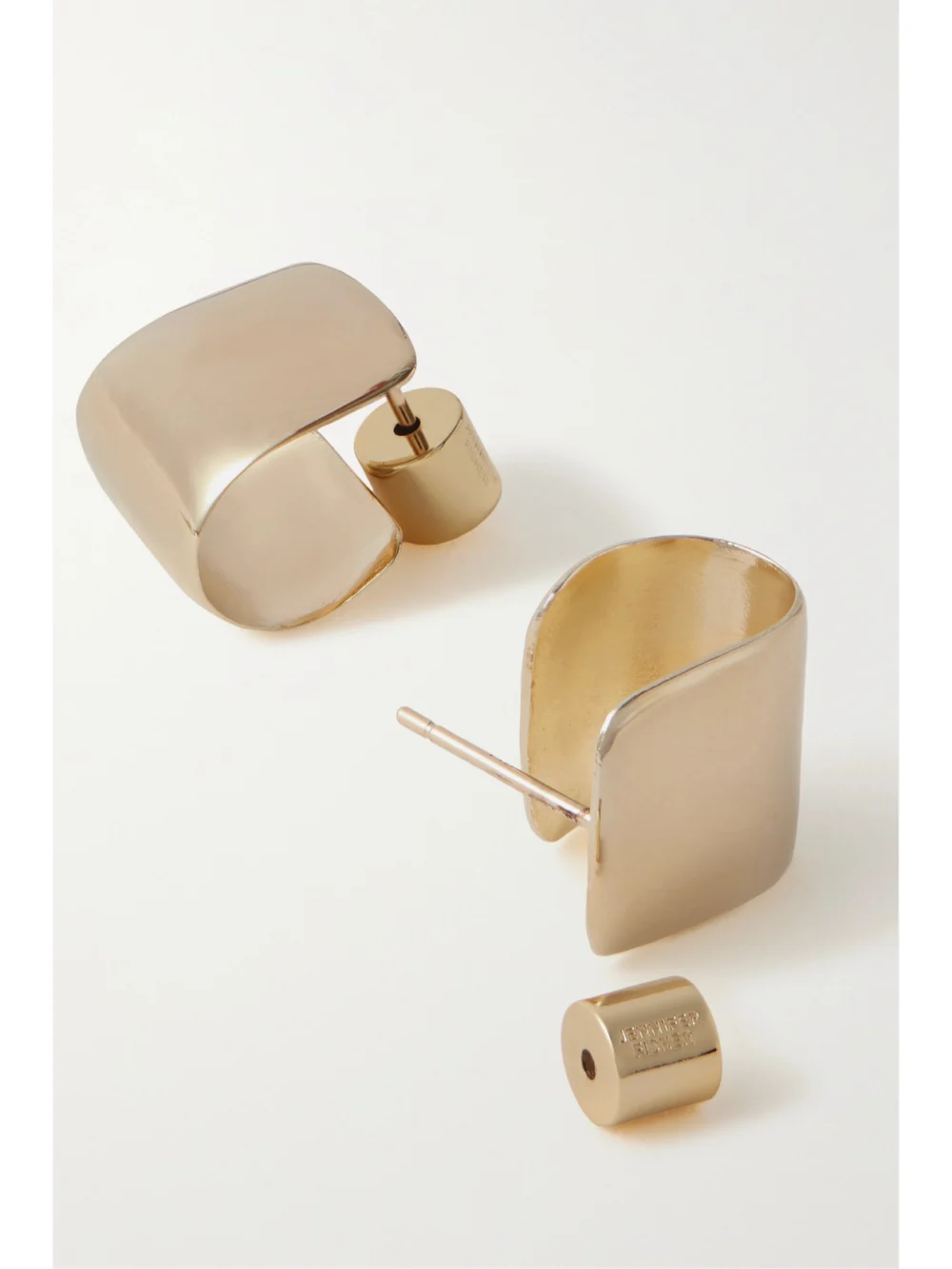 Close-up detail of the Jennifer Fisher Bolden Huggies Gold-plated Hoop Earrings