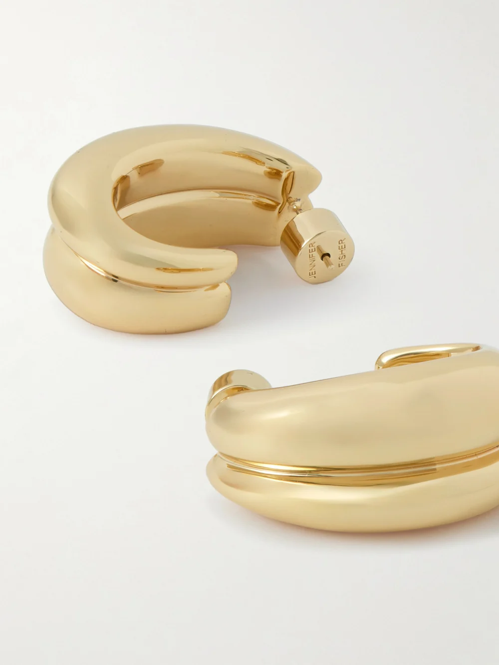 Close-up detail of the Jennifer Fisher Chavez Gold-tone Hoop Earrings