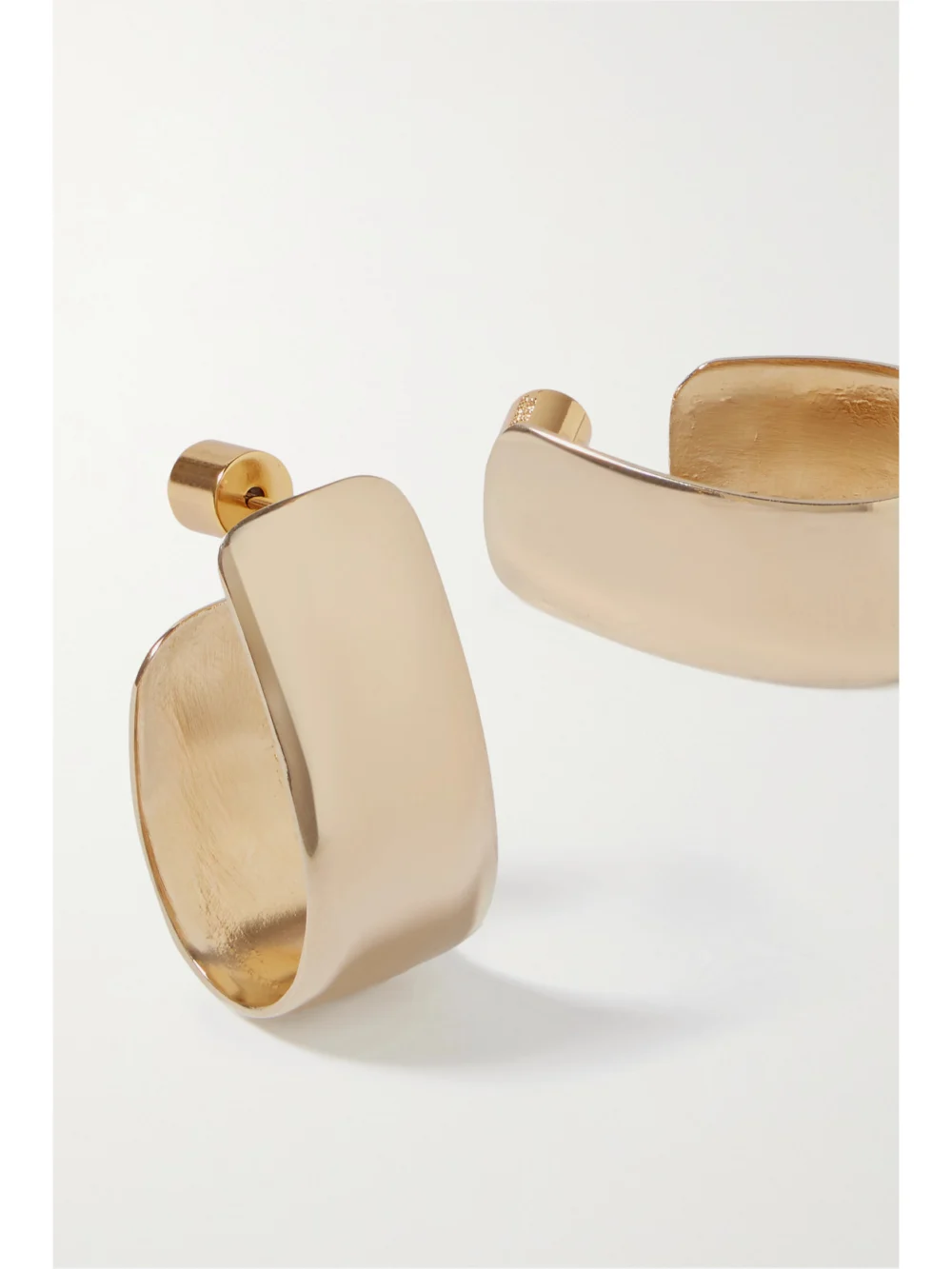Close-up detail of the Jennifer Fisher Small Bolden Gold-plated Hoop Earrings