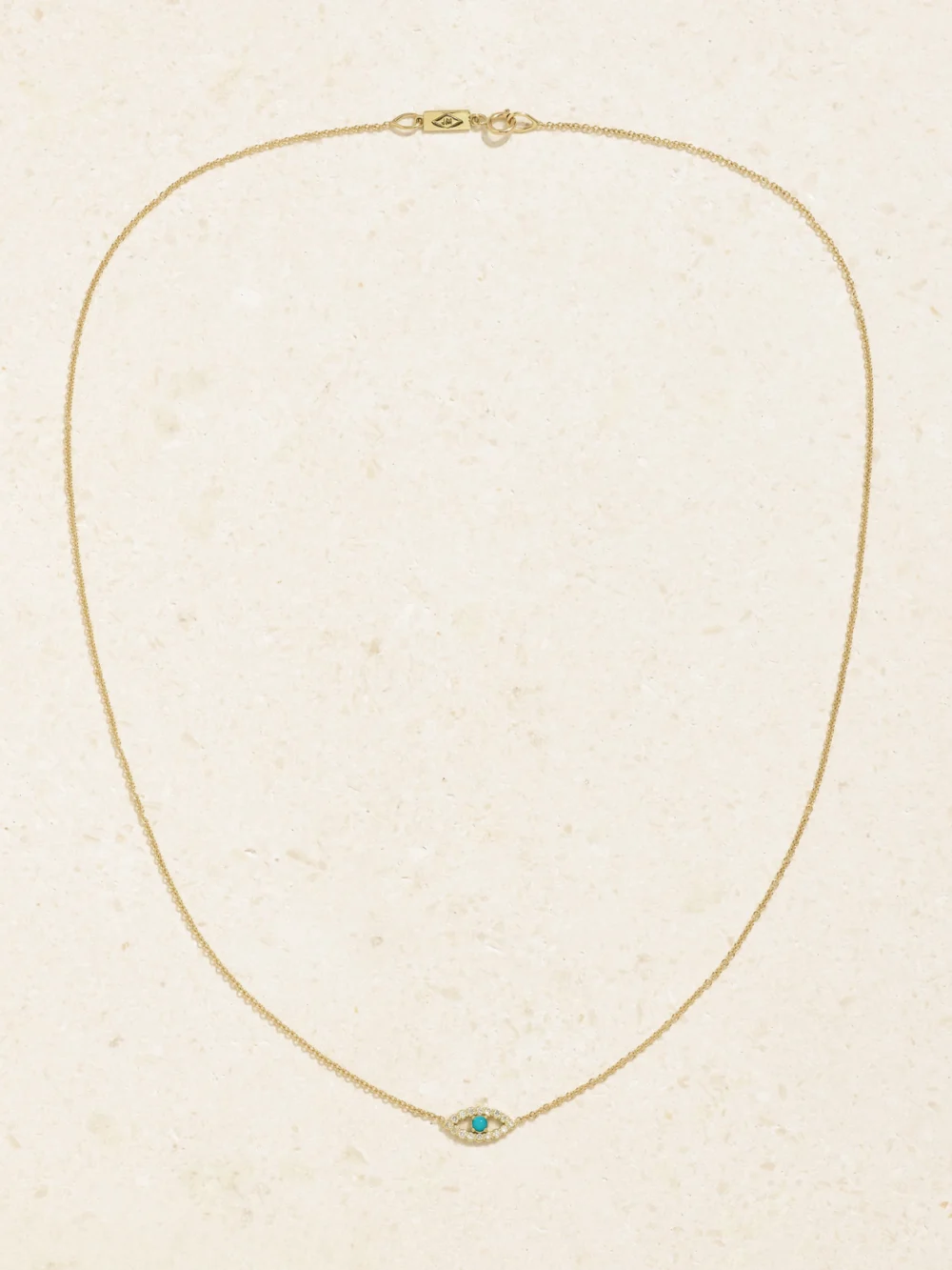 Close-up detail of the Jennifer Meyer Evil Eye Mini 18-karat Gold Diamond and Turquoise Necklace