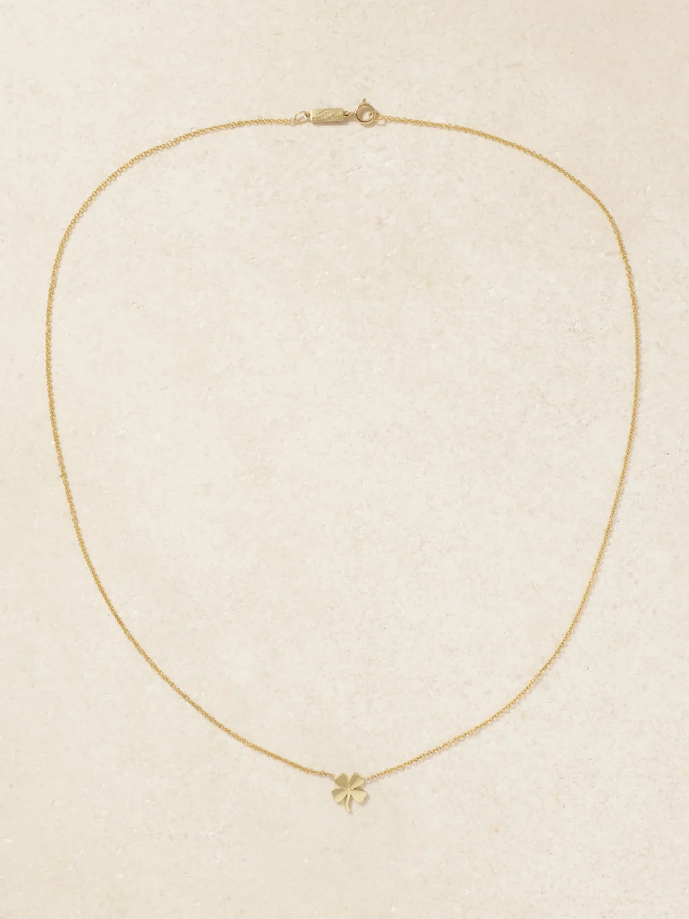 Close-up detail of the Jennifer Meyer Mini Clover 18-karat Gold Necklace