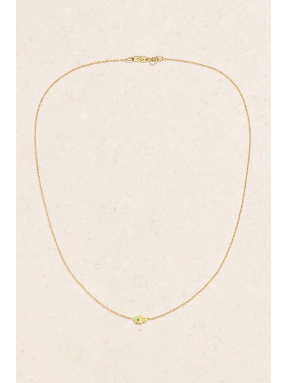 Close-up detail of the Jennifer Meyer Mini Hamsa 18-karat Gold Emerald Necklace