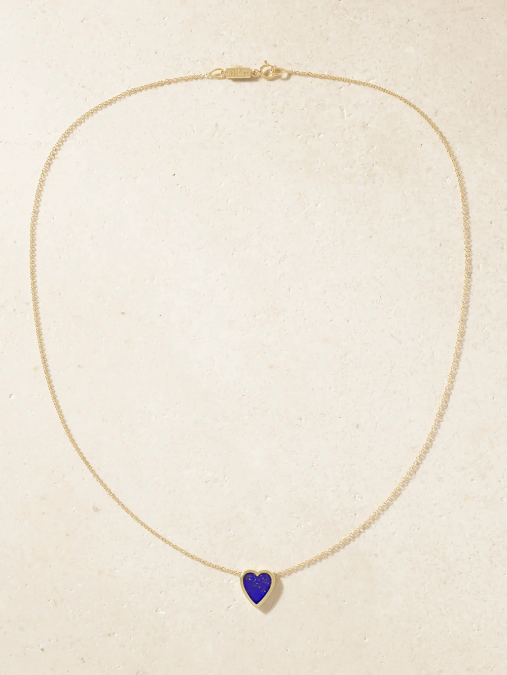 Close-up detail of the Jennifer Meyer Mini Heart 18-karat Gold Lapis Lazuli Necklace