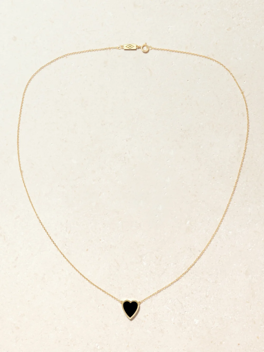Close-up detail of the Jennifer Meyer Mini Heart 18-karat Gold Onyx Necklace