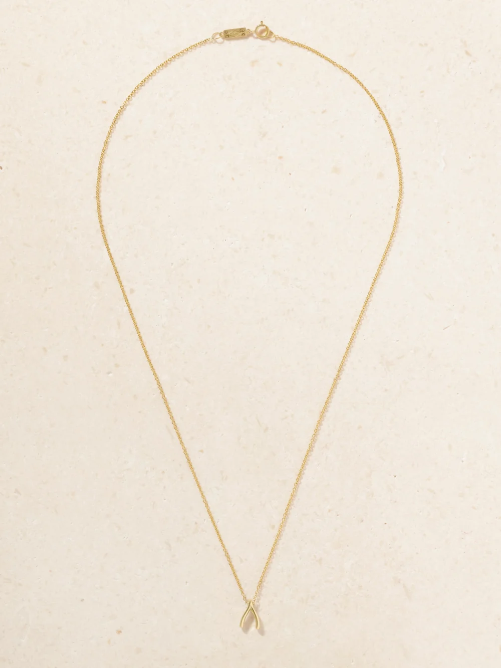 Close-up detail of the Jennifer Meyer Mini Wishbone 18-karat Gold Necklace