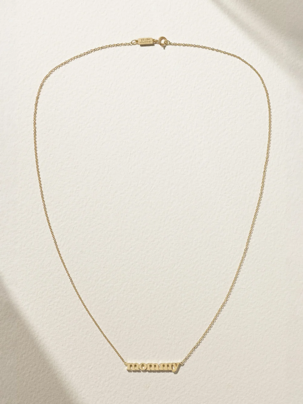 Close-up detail of the Jennifer Meyer Mommy 18-karat Gold Necklace