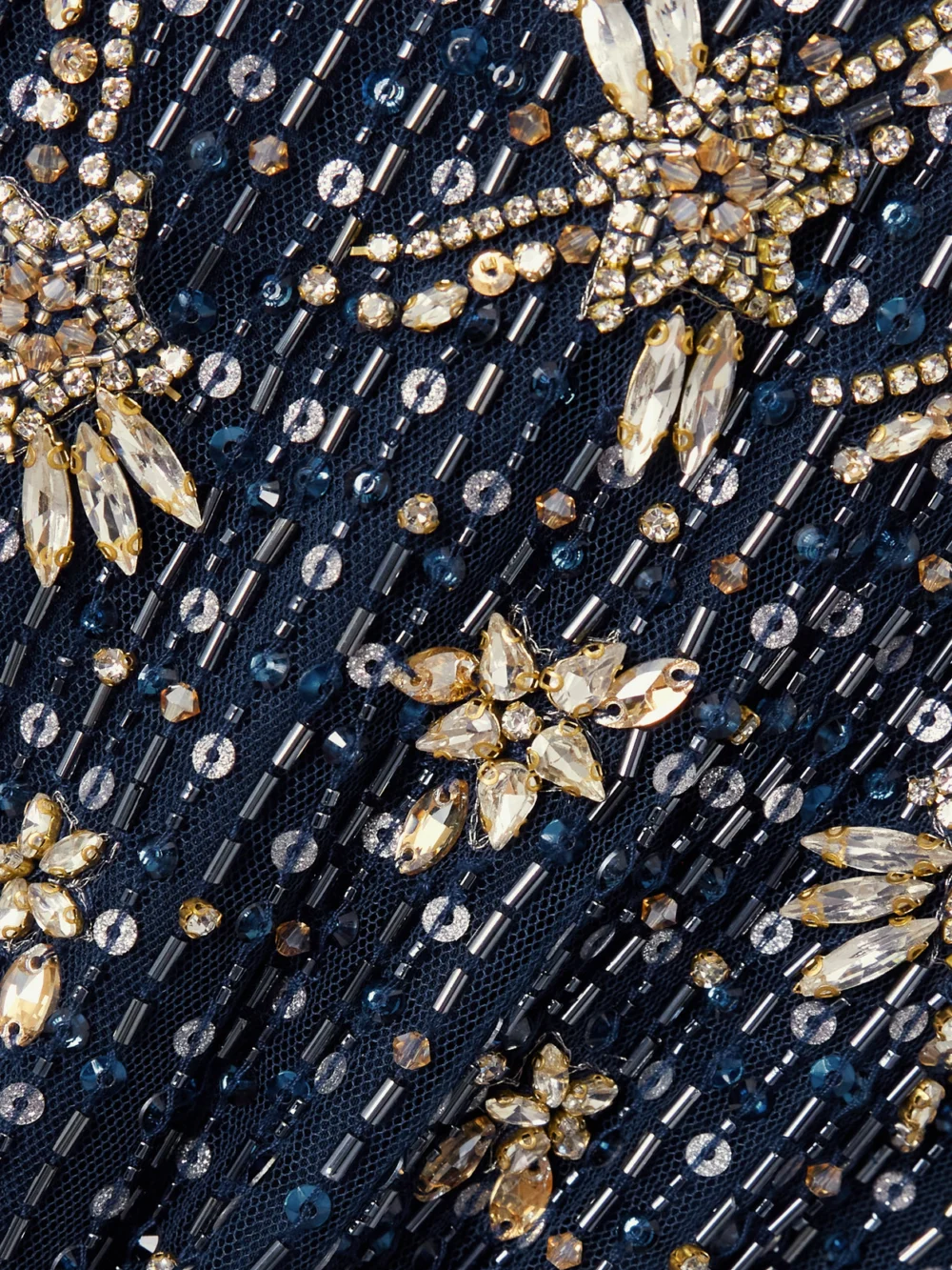 Close-up detail of the Jenny Packham Celeste Cape-effect Embellished Tulle Gown