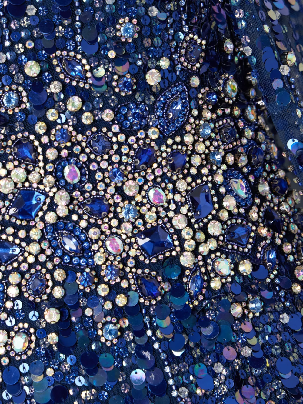 Close-up detail of the Jenny Packham Honey Dew Cape-effect Embellished Tulle Gown
