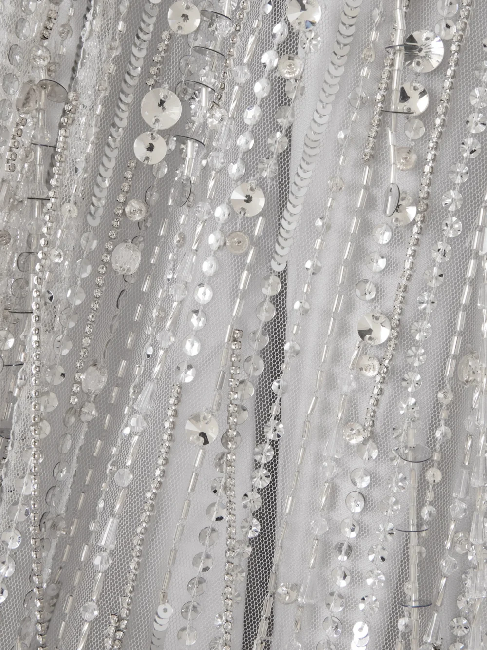 Close-up detail of the Jenny Packham Oberon Ammonite Embellished Fringed Organza Mini Dress