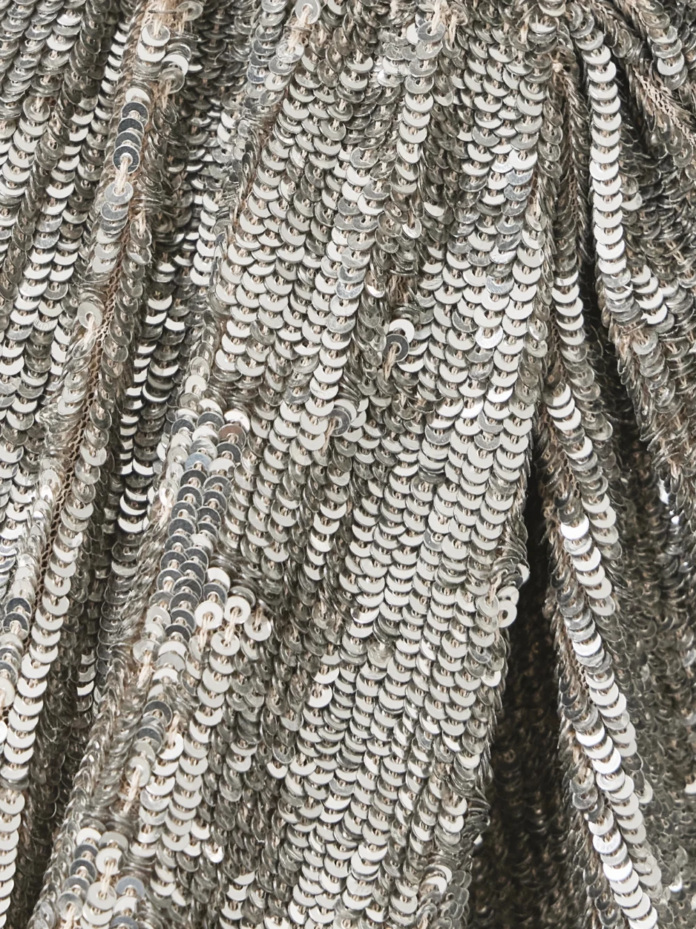 Close-up detail of the Jenny Packham Only You Draped Embellished Tulle Gown