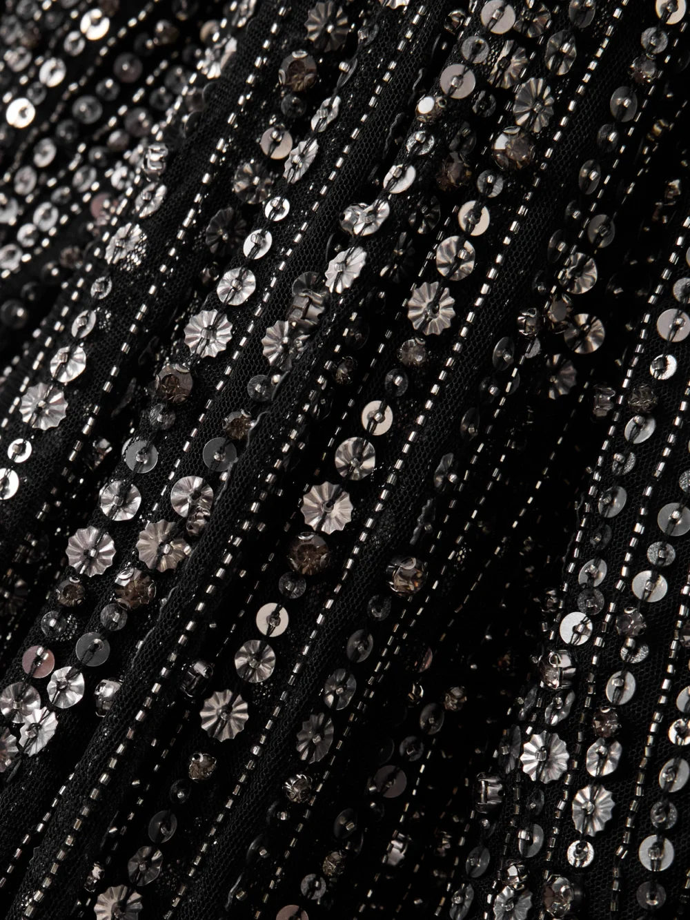 Close-up detail of the Jenny Packham Zenith Cape-effect Embellished Chiffon Gown