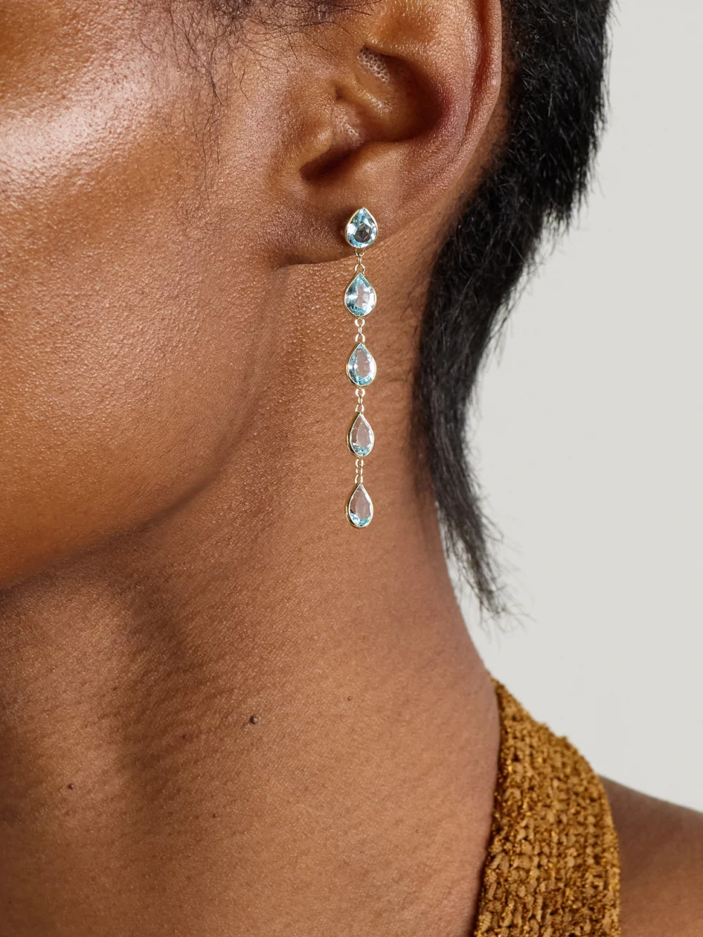 Jia Jia Chakra Gold Topaz Earrings, styled view