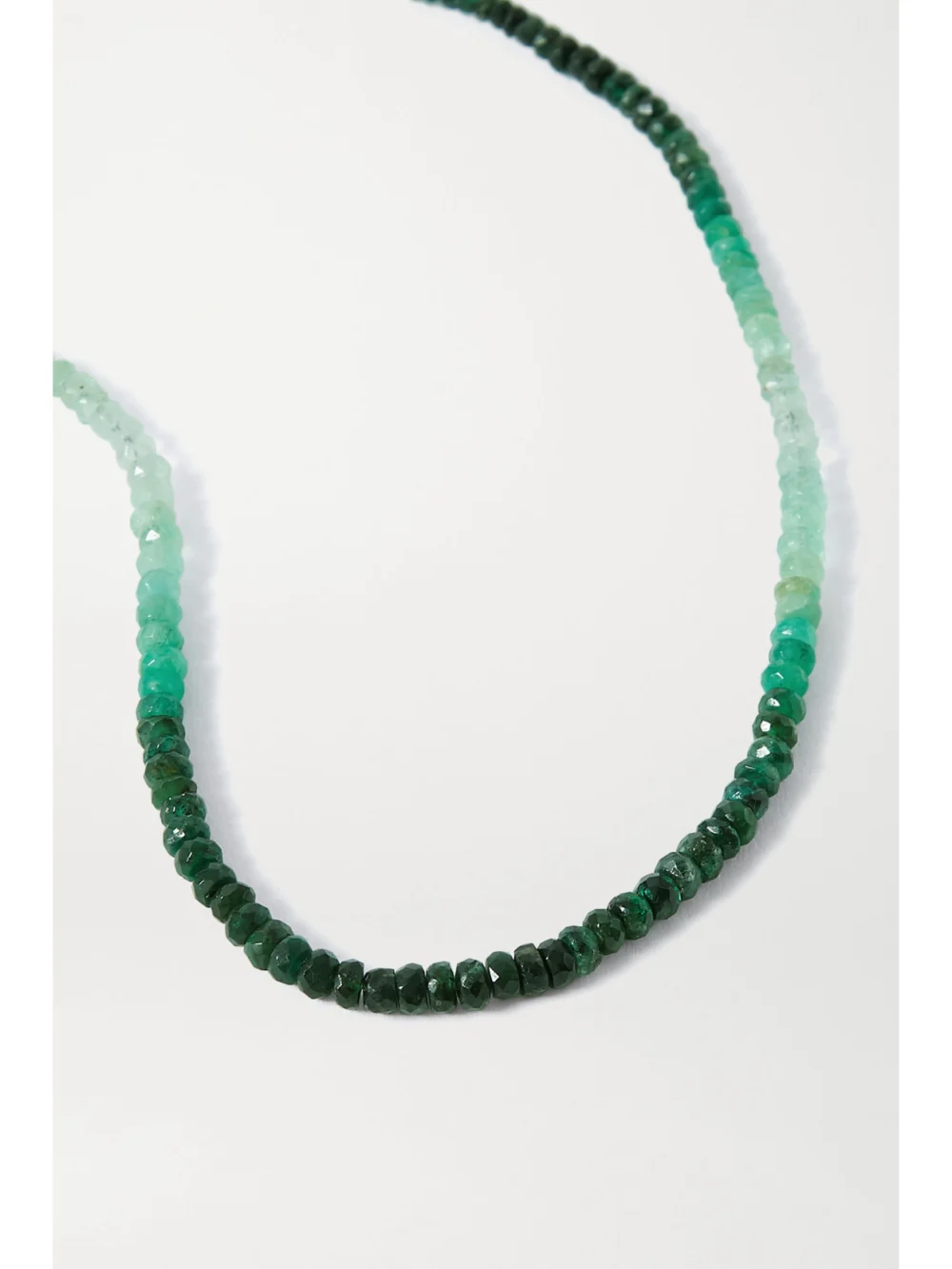 Close-up detail of the Jia Jia Gold Emerald Necklace