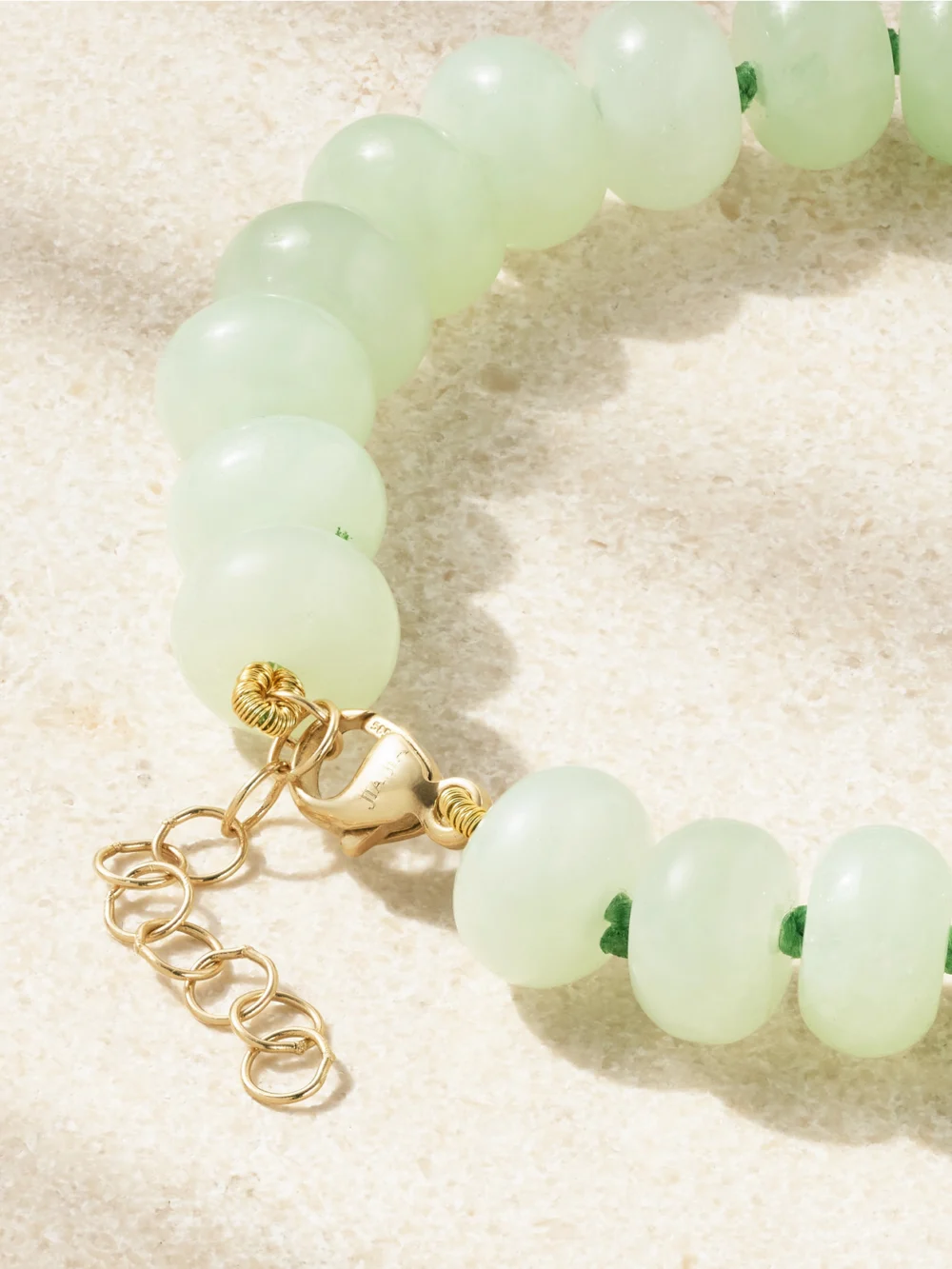 Close-up detail of the Jia Jia Gold Jade Bracelet