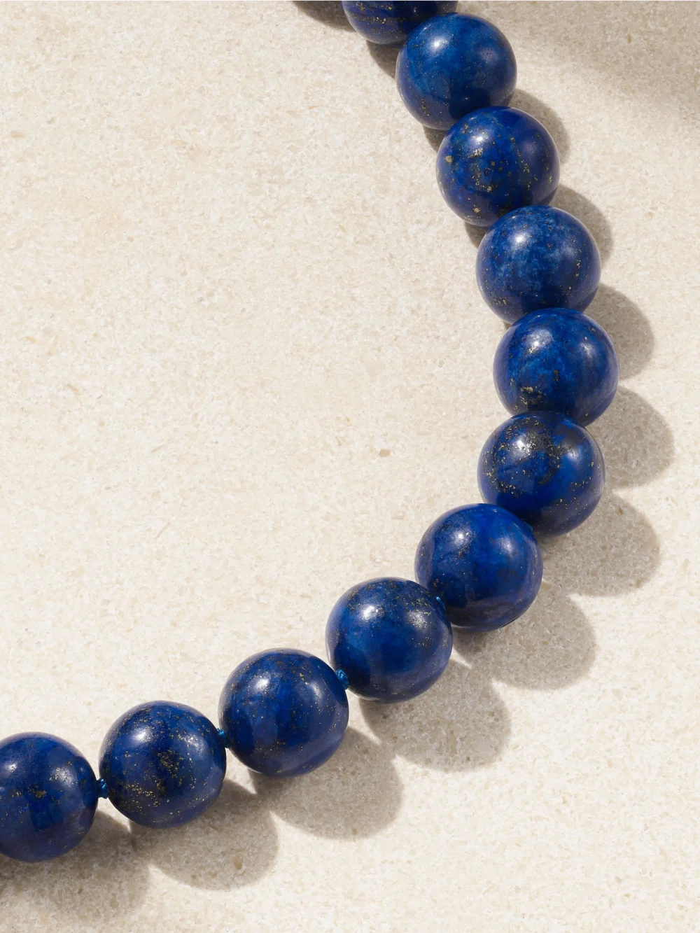 Close-up detail of the Jia Jia Gold Lapis Lazuli Necklace
