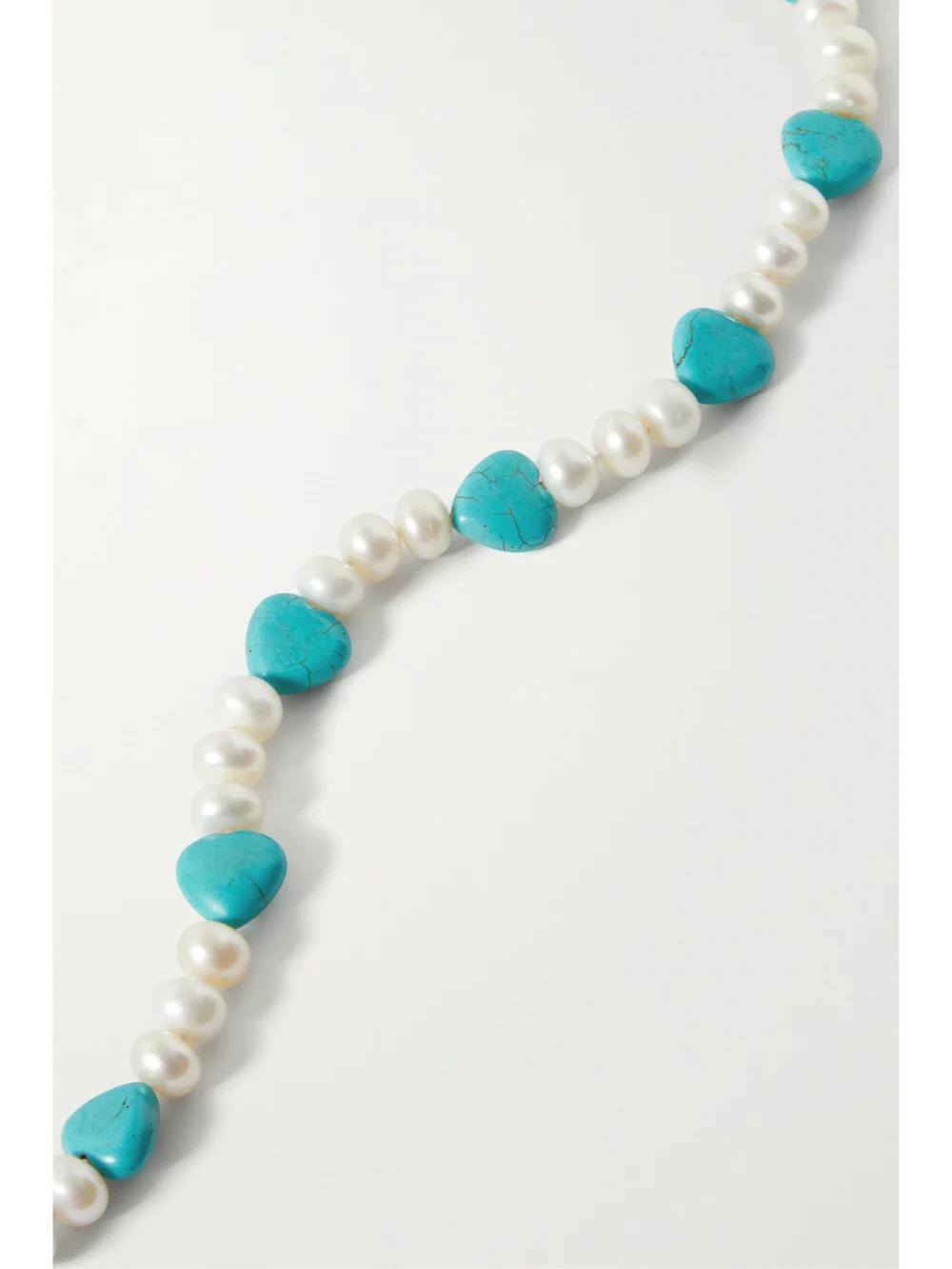 Close-up detail of the Jia Jia Gold-tone Turquoise and Pearl Necklace