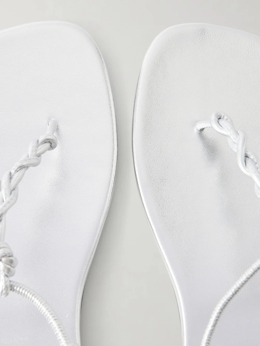 Close-up detail of the Jil Sander Braided Metallic Leather Sandals