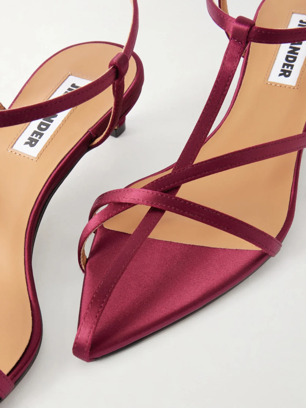 Close-up detail of the Jil Sander Cage Satin Sandals