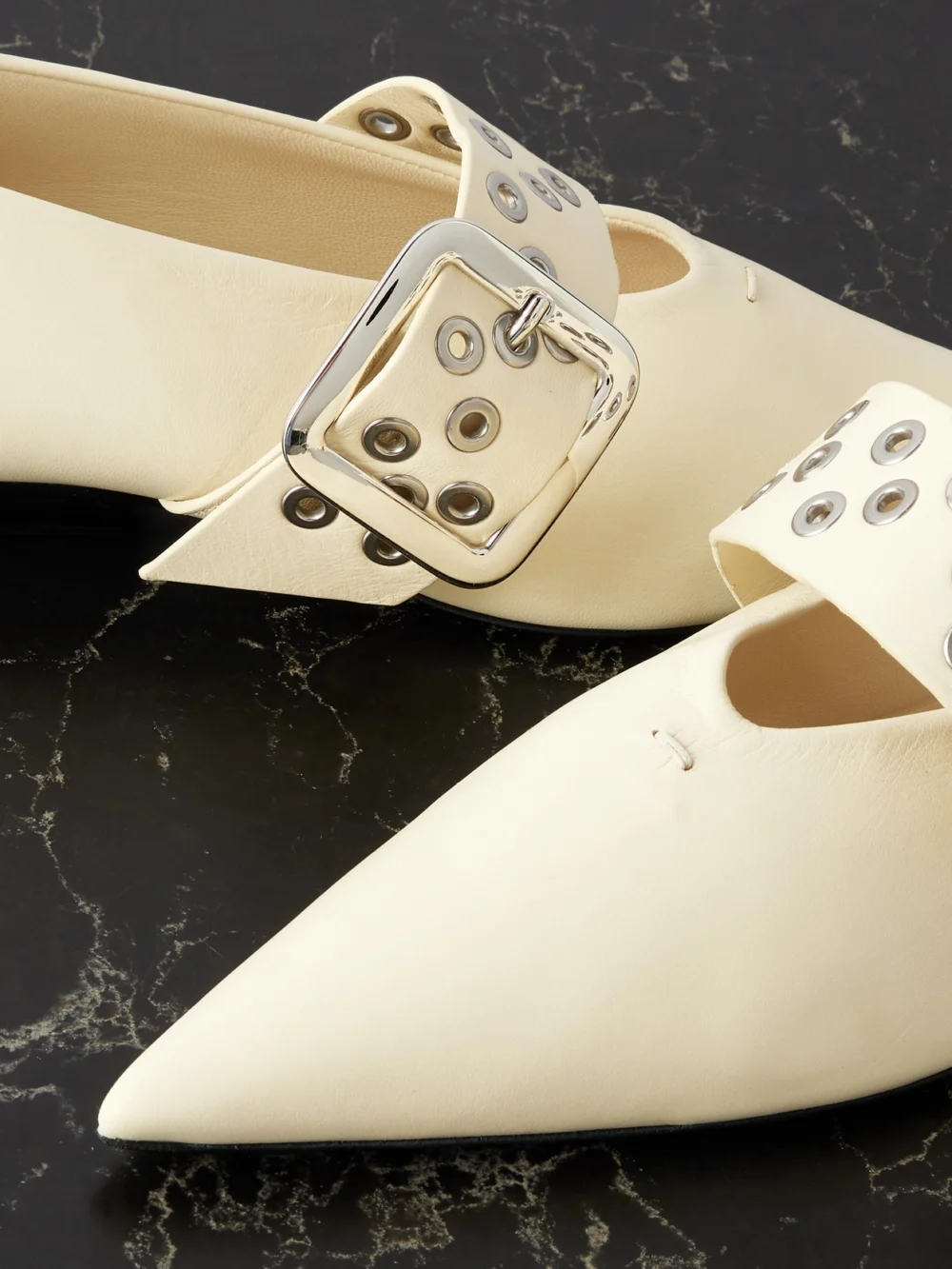 Close-up detail of the Jil Sander Eyelet-embellished Leather Mary-jane Ballet Flats