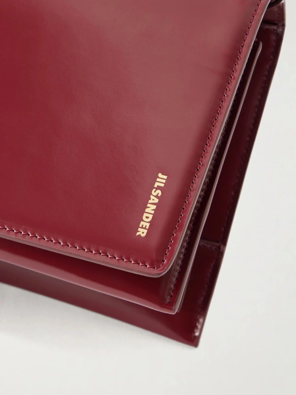Close-up detail of the Jil Sander File Small Leather Shoulder Bag