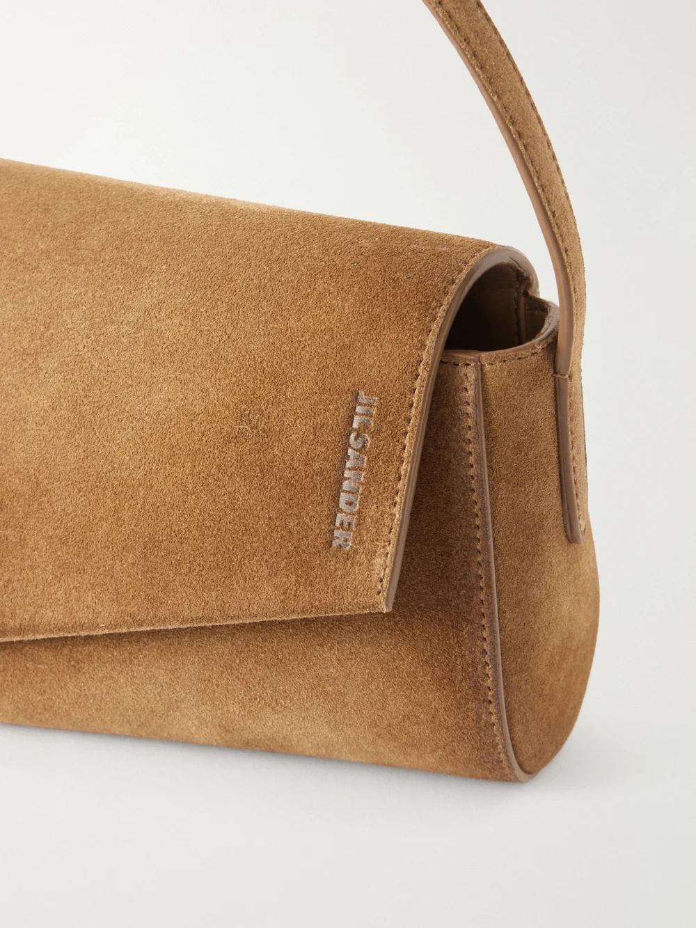Close-up detail of the Jil Sander Kante Suede Shoulder Bag