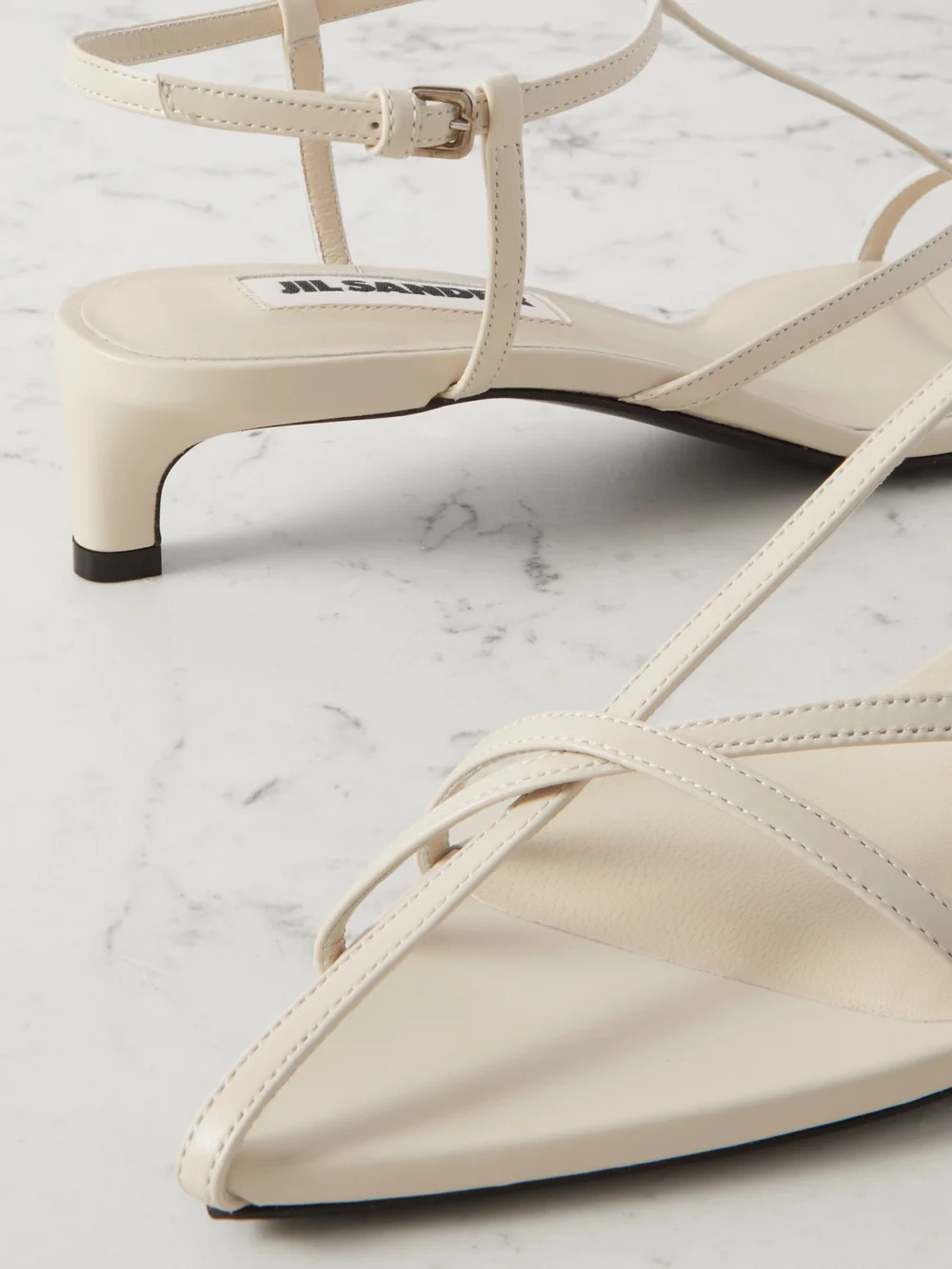 Close-up detail of the Jil Sander Leather Slingback Sandals