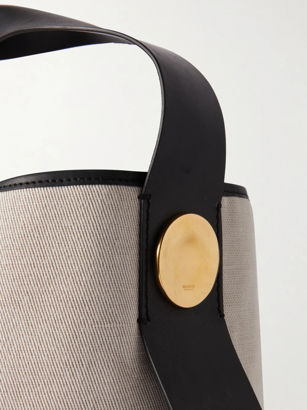 Close-up detail of the Jil Sander Leather-trimmed Canvas Tote