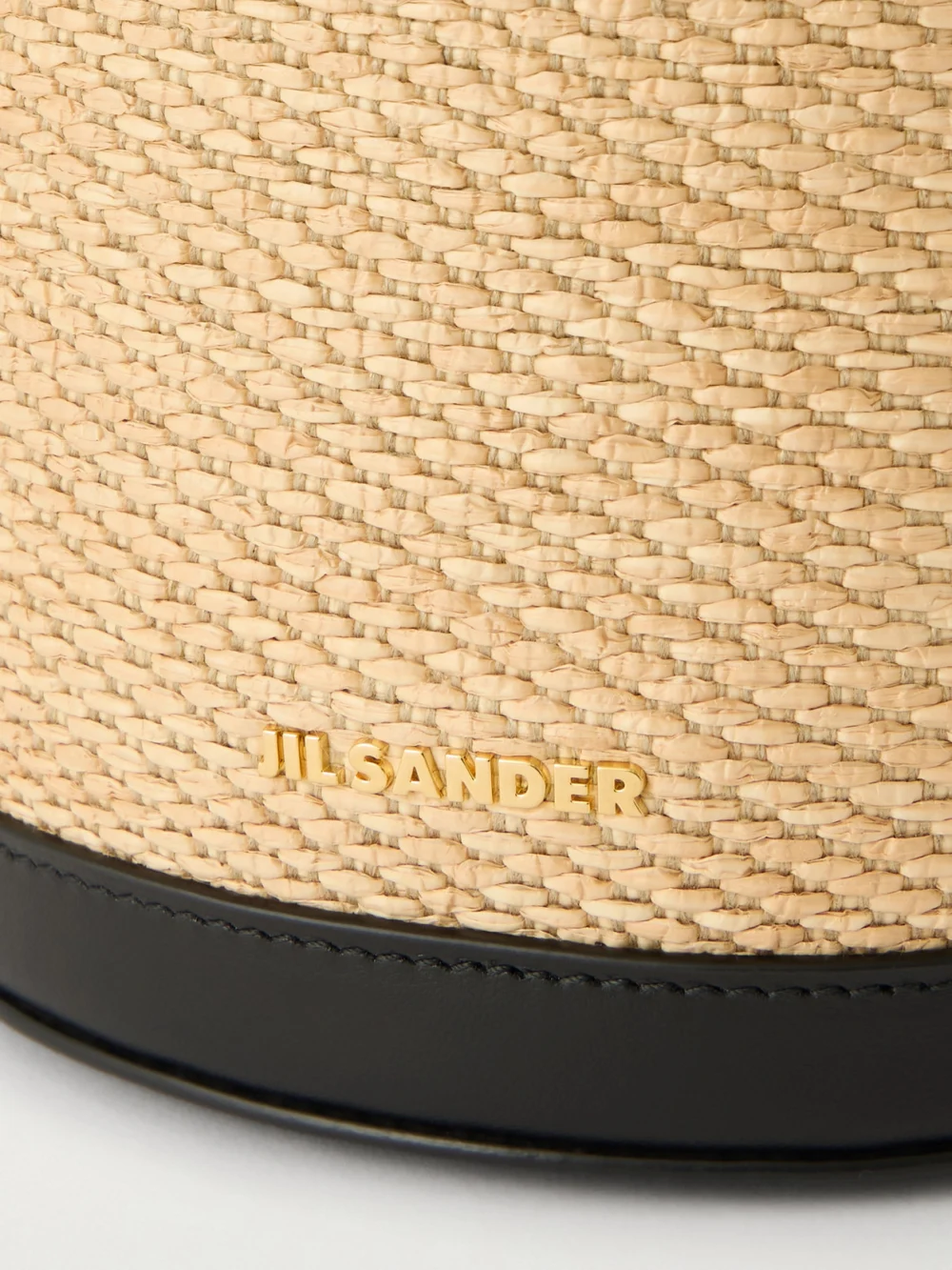 Close-up detail of the Jil Sander Leather-trimmed Raffia Bucket Bag