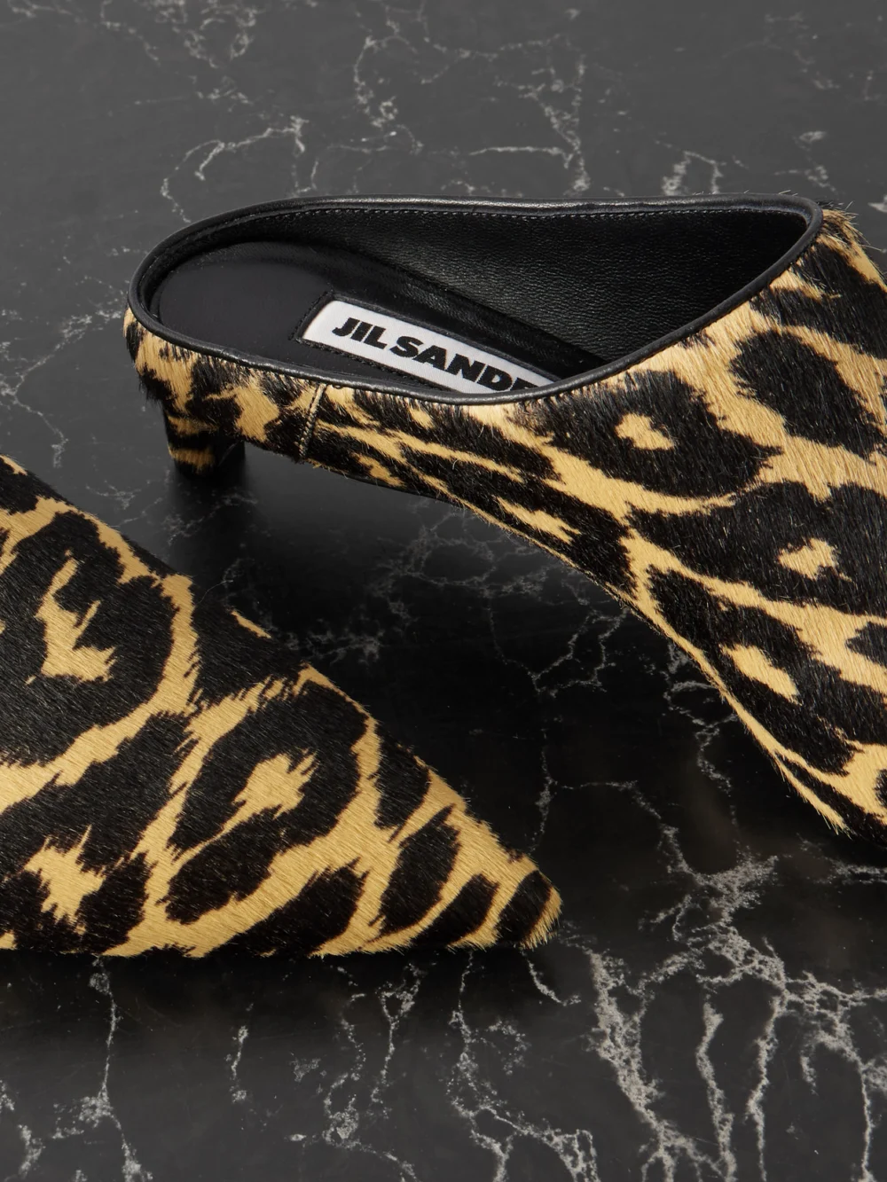 Close-up detail of the Jil Sander Leopard-print Calf Hair Mules