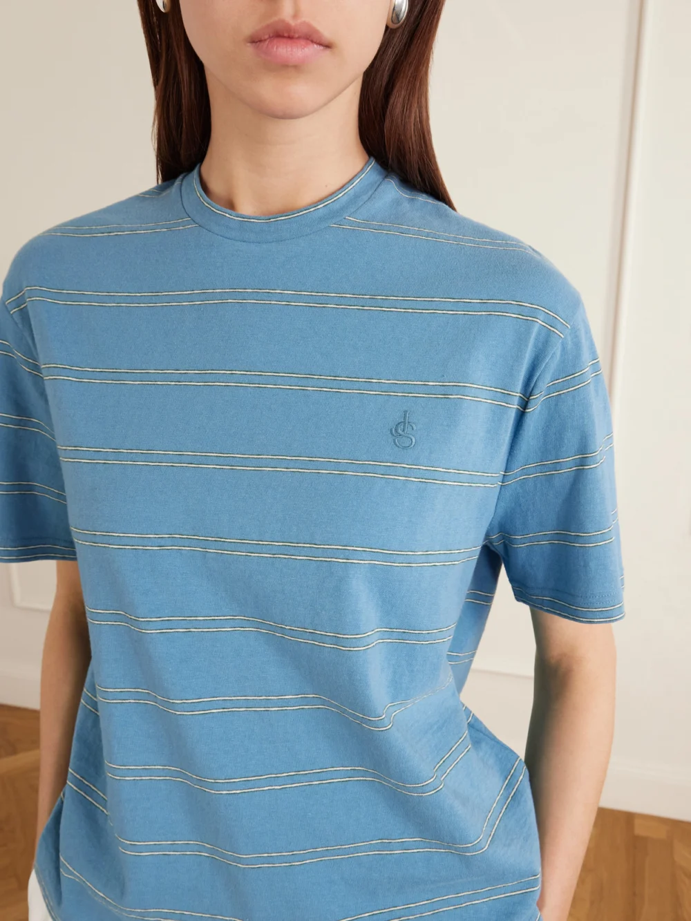 Close-up detail of the Jil Sander Logo-embossed Striped Cotton T-shirt