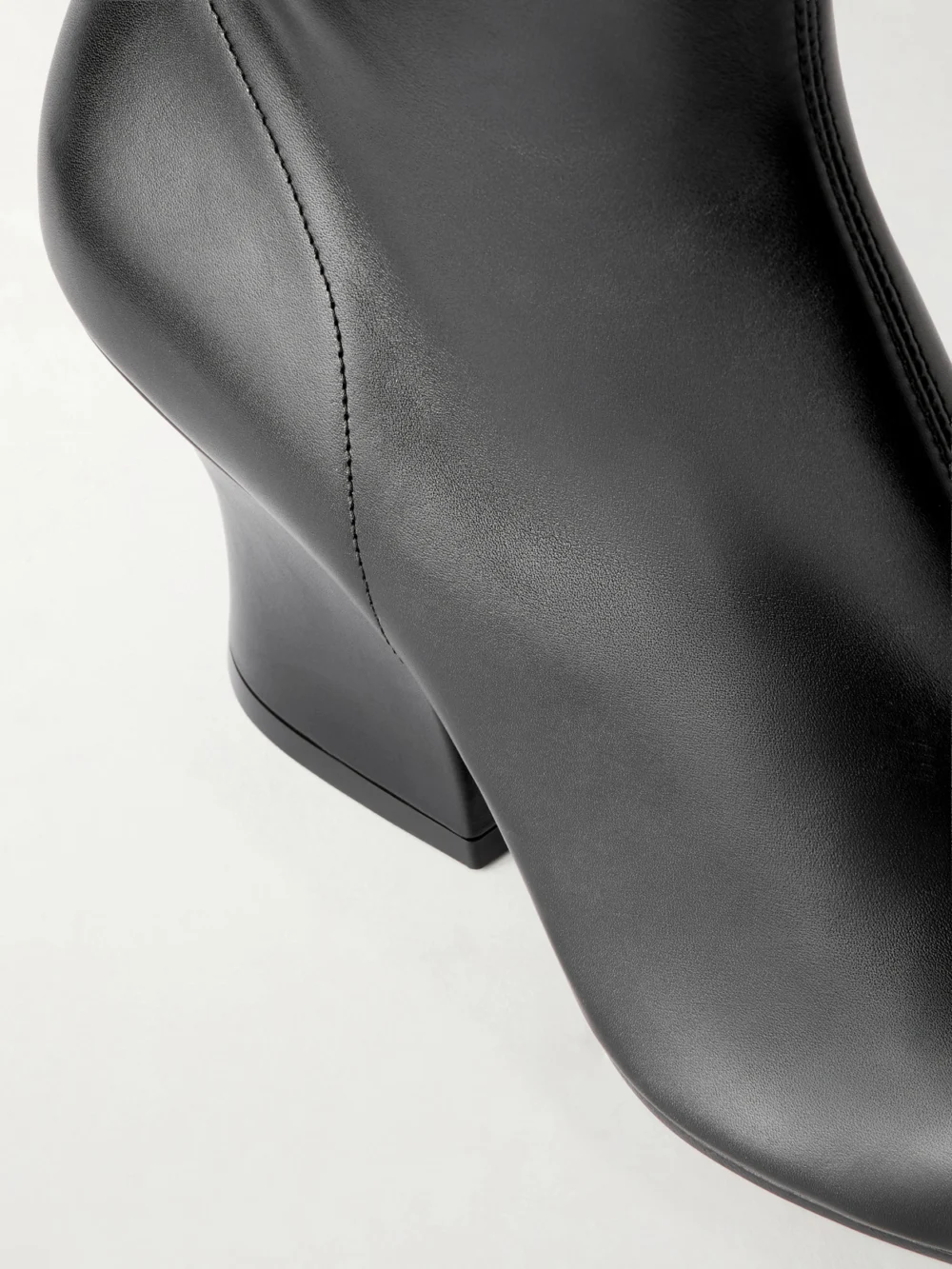 Close-up detail of the Jil Sander Lune Leather Ankle Boots